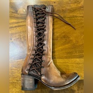 Unique Cowboy boots that have side ties